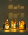 DN DECONATION porcelain village houses, 3 pieces with frosted trees